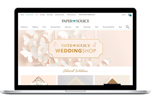 image of Paper Source Wedding Shop landing page on a laptop computer